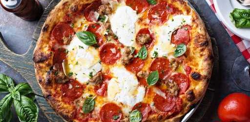 Everything You Need to Make Pizza At Home For the Super Bowl So You Can Skip the Pricey Delivery