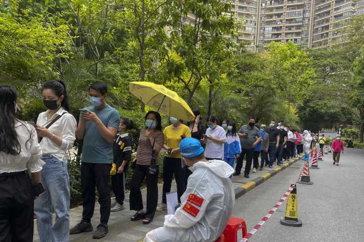 Guangzhou closes to most arrivals as China’s outbreak grows