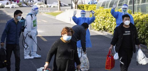 Shanghai discharges thousands of patients, boosts supplies