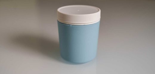 A specimen collection cup that creates a more favorable environment for sperm