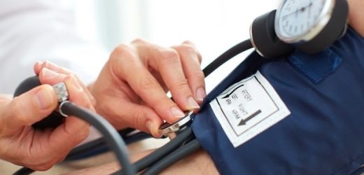 Simple, low-cost clip uses a smartphone's camera and flash to monitor blood pressure