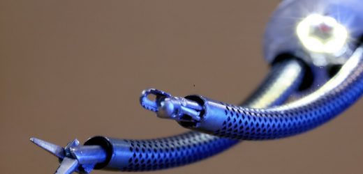Engineers develop prototype two-armed, joystick-controlled neurosurgical robot